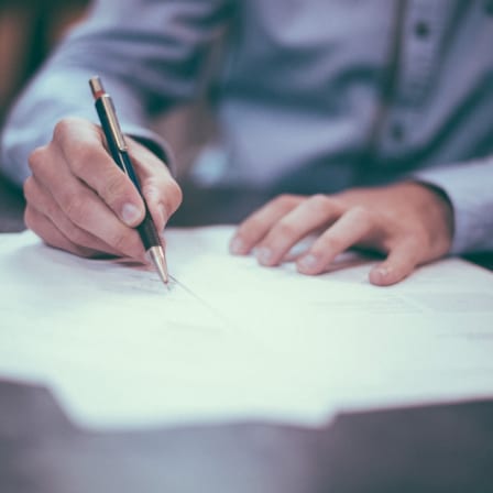 Person signing legal documents